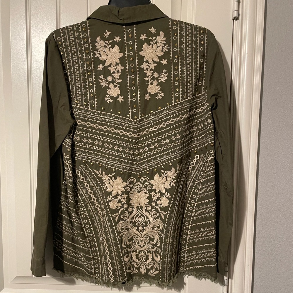 Sage colored blouse with embroidered design and brass accents